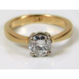 An 18ct gold diamond solitaire ring set with approx. 0.75ct diamond size K 4.2g