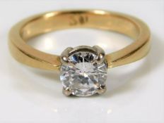 An 18ct gold diamond solitaire ring set with approx. 0.75ct diamond size K 4.2g