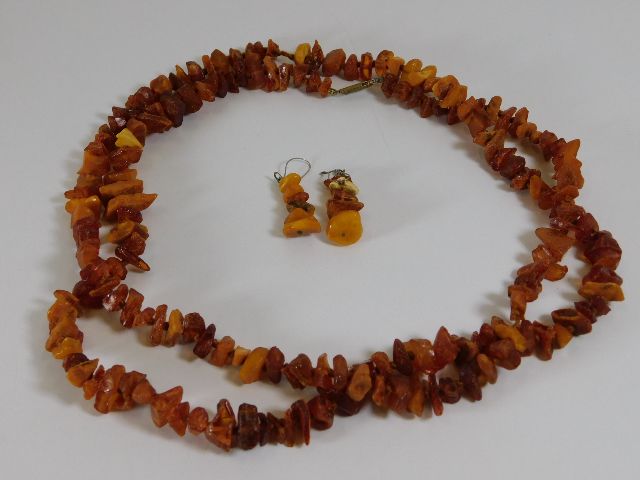 Two rows of amber beads & a pair of earrings