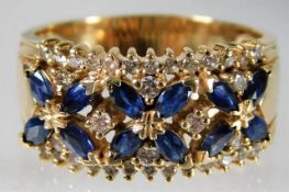 A 14ct gold diamond & sapphire ring size T/U 7.3g