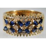 A 14ct gold diamond & sapphire ring size T/U 7.3g