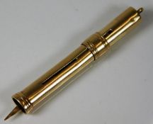 A 9ct gold cigar piercer 3.56g