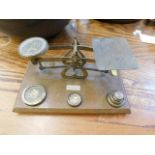 A pair of brass postal style scales