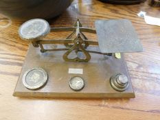 A pair of brass postal style scales