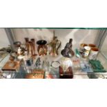 A quantity of 20thC. ethnic & tourist ware items i