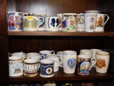 A quantity of mixed commemorative mugs & beakers