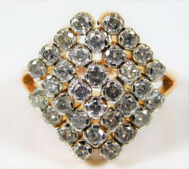A 14ct ring set with 1ct diamonds size N 5.3g