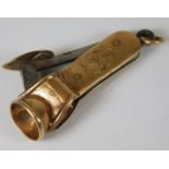 A 9ct gold cigar cutter, inscribed 12.68g