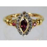 An 18ct gold ring set with diamond & ruby size I 3