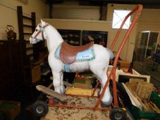 A vintage Triang childs ride along toy horse