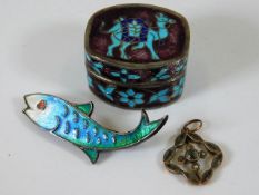 A silver & enamel fish brooch with silver & enamel