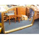 A large modern decorative overmantle mirror 136cm