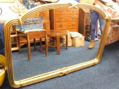 A large modern decorative overmantle mirror 136cm