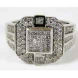 A 14ct art deco style white gold ring set with app