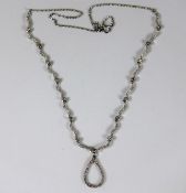 An 18ct white gold diamond necklace 14in 5.6g