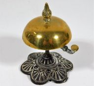 A Victorian brass & cast iron desk bell