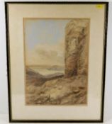 A framed watercolour depicting a ruin overlooking