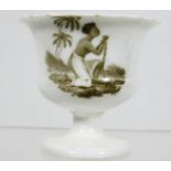 A 19thC. egg cup with slave trade motive