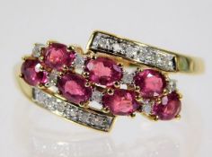 A 9ct gold ring set with ruby & diamond 2.9g size