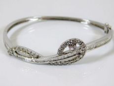 An 18ct white gold diamond bangle set with 2ct dia