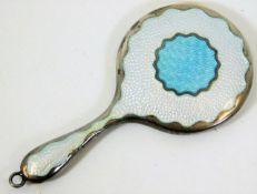 A small enamelled silver mounted novelty mirror 9.