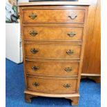A five drawer chest of drawers with brass fittings