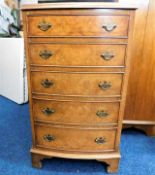 A five drawer chest of drawers with brass fittings