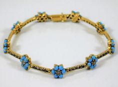 An 18ct gold natural turquoise bracelet 14.5g 7in