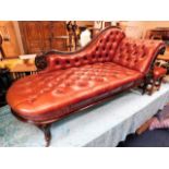 A Victorian mahogany leather Chesterfield chaise l