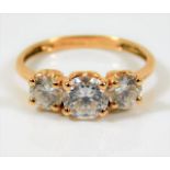 A 14ct gold ring set with white stones 3.1g size O