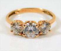 A 14ct gold ring set with white stones 3.1g size O