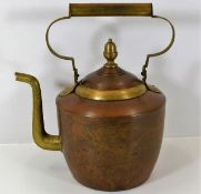 A large antique copper & brass fireside kettle 14.