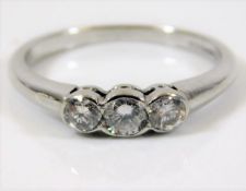 An 18ct white gold diamond ring set three three st