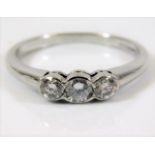 An 18ct white gold diamond ring set three three st