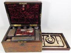 A 19thC. velvet lined rosewood ladies vanity box w