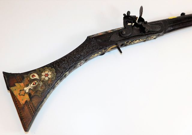 An 18thC. Ottoman Empire style long gun inlaid wit