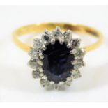 An 18ct gold ring set with sapphire & diamond 3.2g