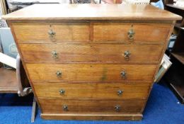 A Heal & Son of London oak chest of drawers with brass fittings W48in x H41.5in x D21in