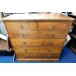 A Heal & Son of London oak chest of drawers with brass fittings W48in x H41.5in x D21in