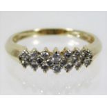 A 14ct gold ring set with 0.6ct diamond 3g size R