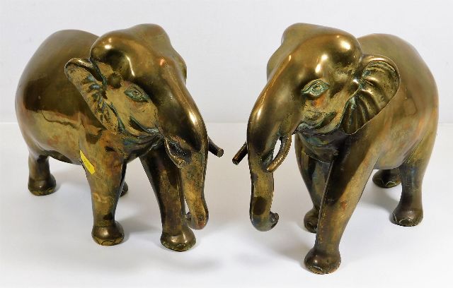 A vintage pair of brass elephants