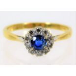 An 18ct gold ring set with diamonds 2.5g size N
