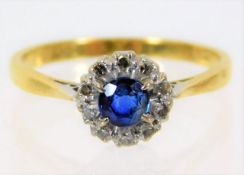 An 18ct gold ring set with diamonds 2.5g size N