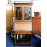 An Edwardian mahogany bureau bookcase with glazed