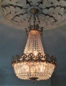 A cut glass chandelier with gilt fittings 30in hig