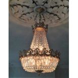 A cut glass chandelier with gilt fittings 30in hig