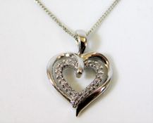 A 9ct white gold chain & heart shaped pendant set