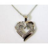 A 9ct white gold chain & heart shaped pendant set