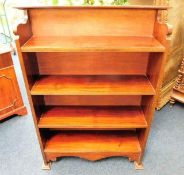 A mahogany floor standing bookcase twinned with a