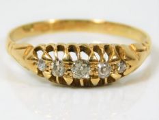 An antique 18ct gold ring set with five old cut di